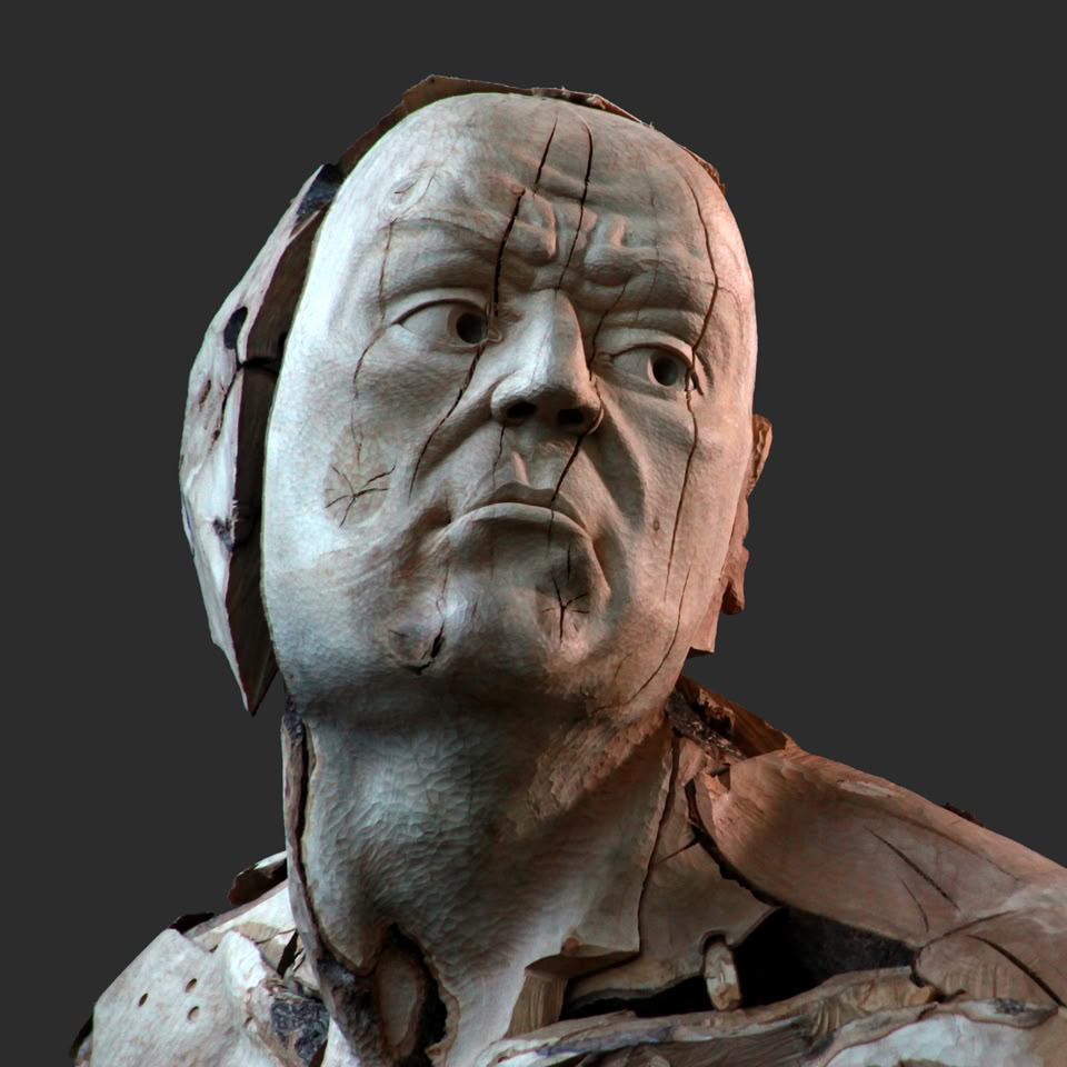 carved wooden figure by jamie frost
