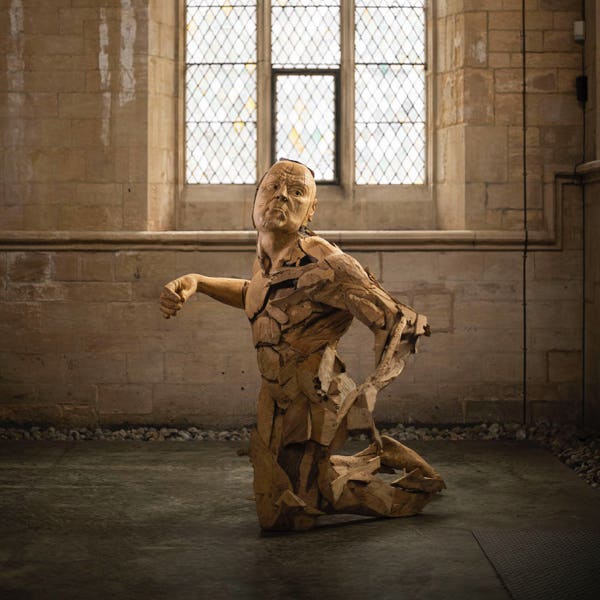 carved wooden figure by jamie frost