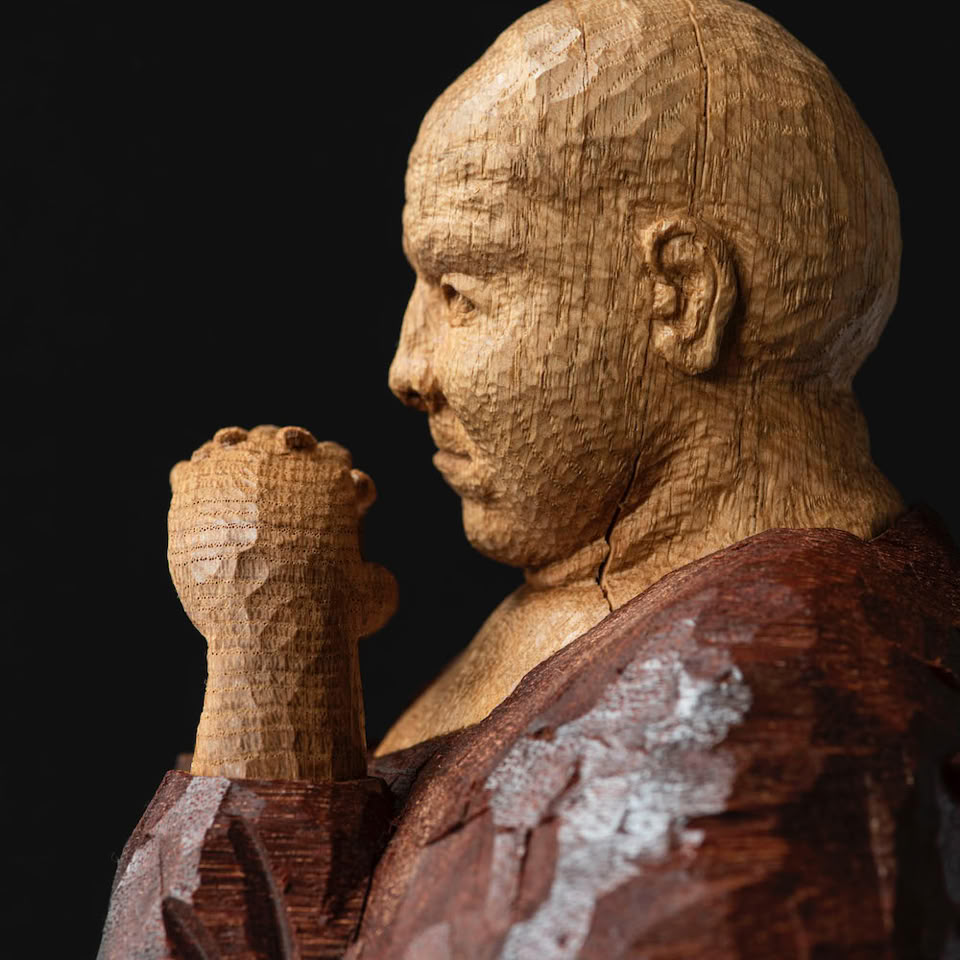 wooden figure sculpture by jamie frost