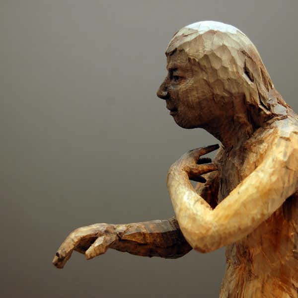 wooden figure sculpture by jamie frost