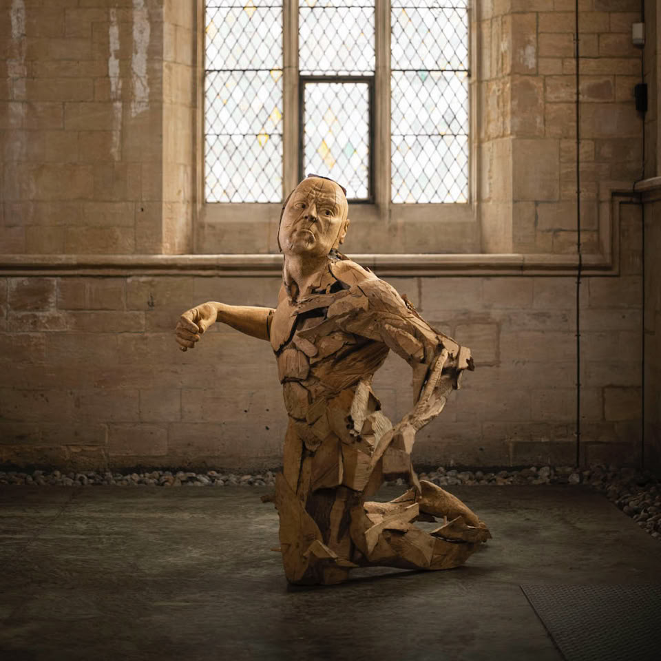 carved wooden figure by jamie frost