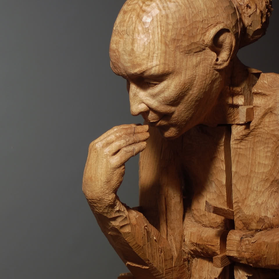carved wooden figure by jamie frost