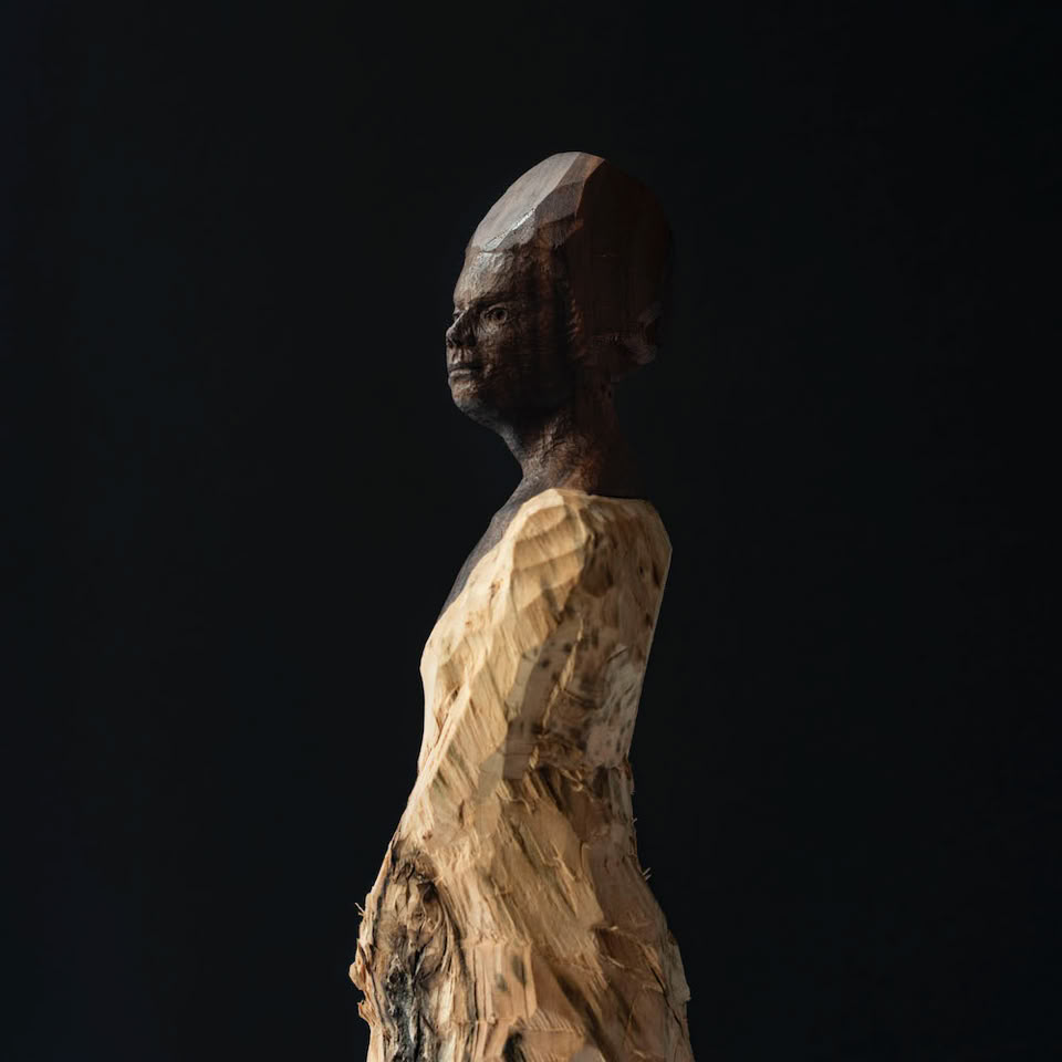 wooden figure sculpture by jamie frost