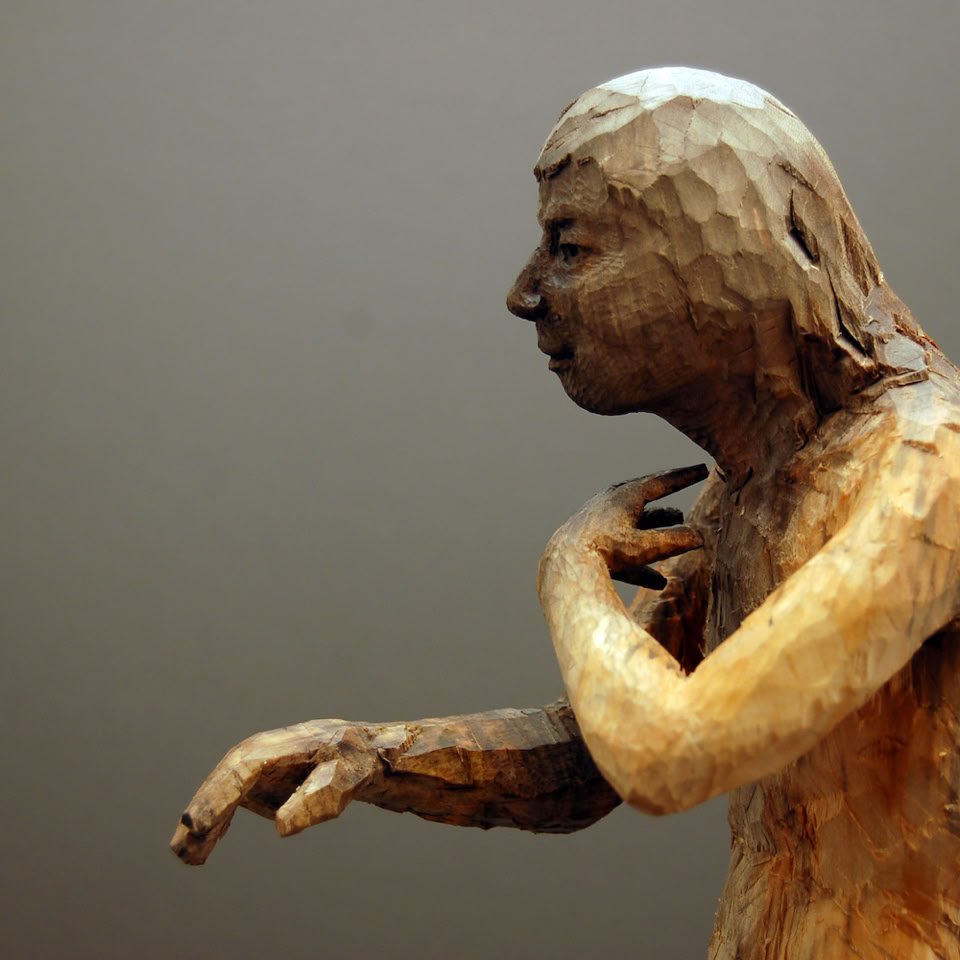 wooden figure sculpture by jamie frost