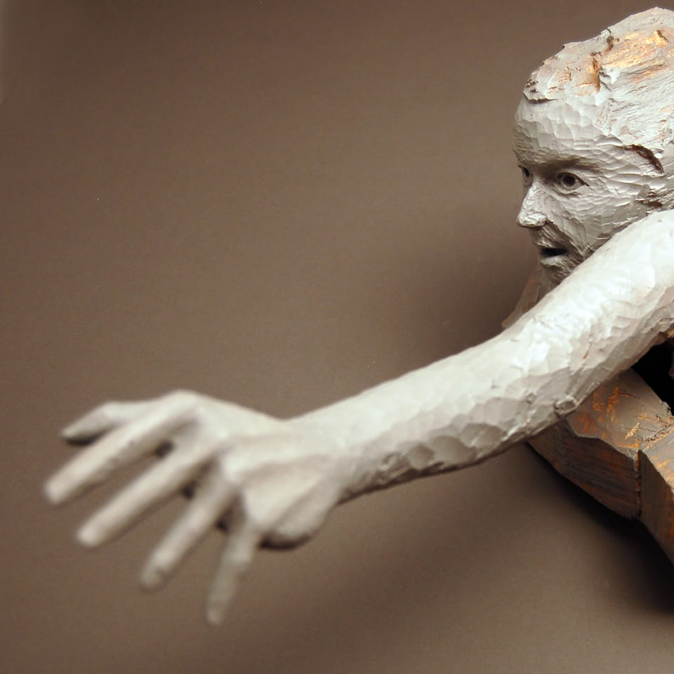 wooden figure sculpture by jamie frost
