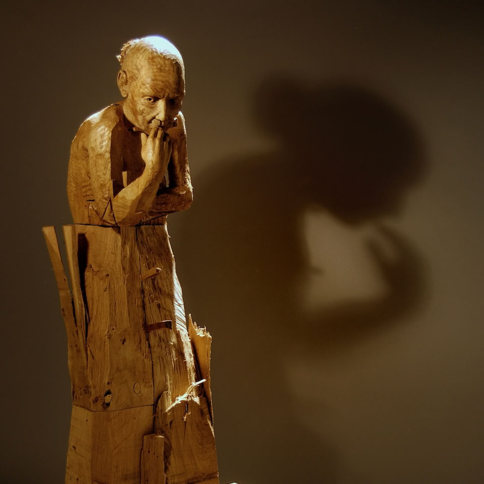 carved wooden figure by jamie frost